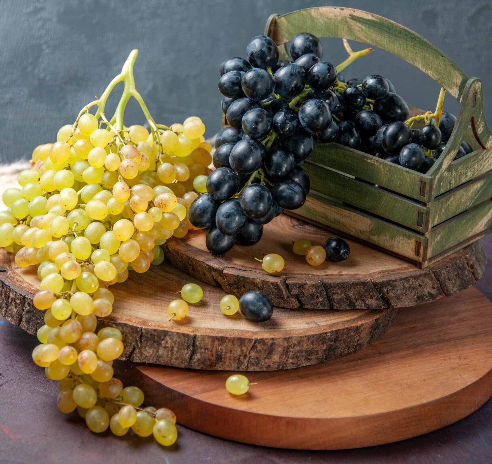 front view fresh mellow grapes dark green fruits dark surface wine grape fruit ripe fresh tree plant